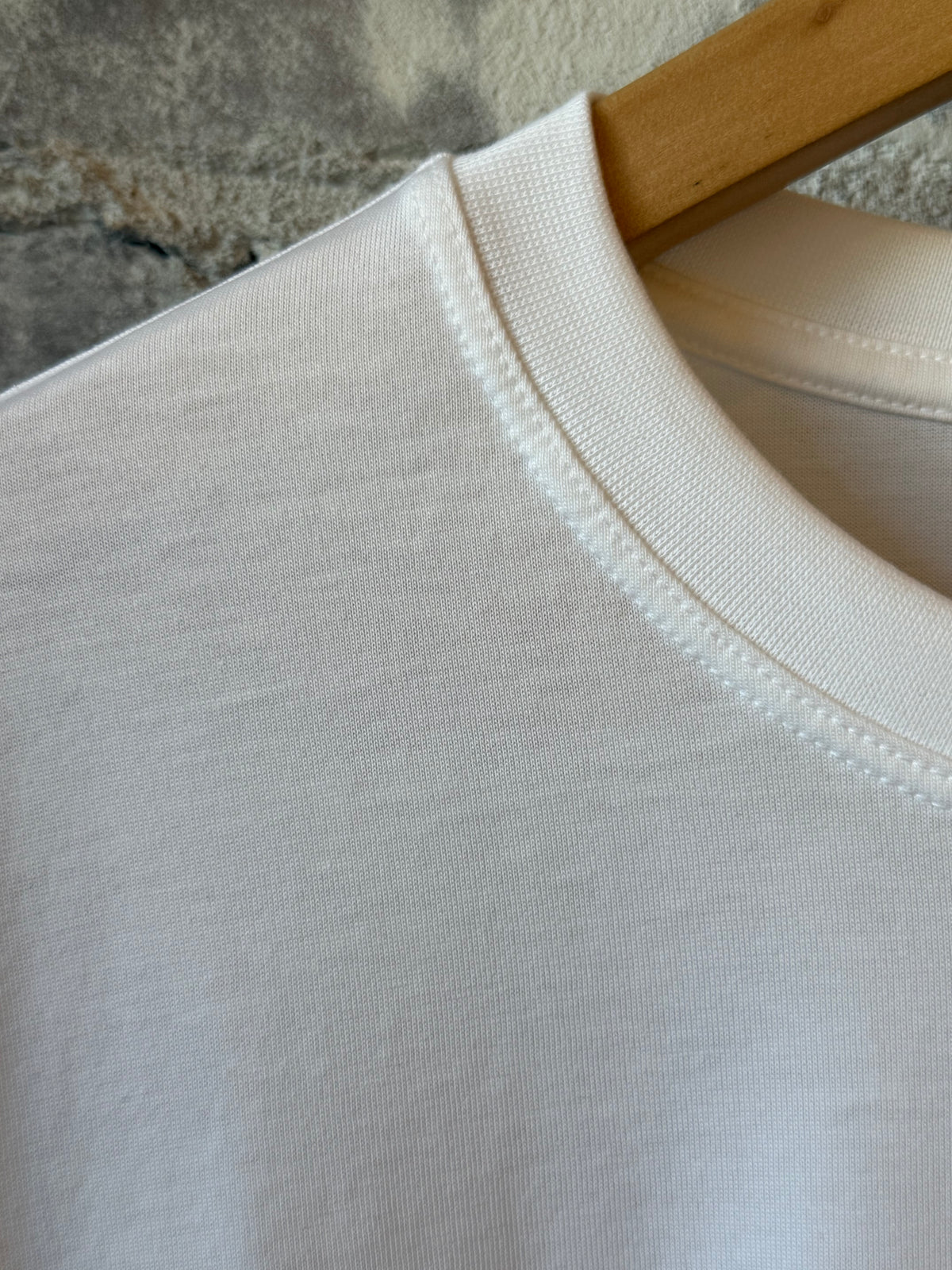 Men's white Super Soft Supima long-sleeve T-shirt by Ace Rivington, showcasing a comfortable fit and smooth fabric.