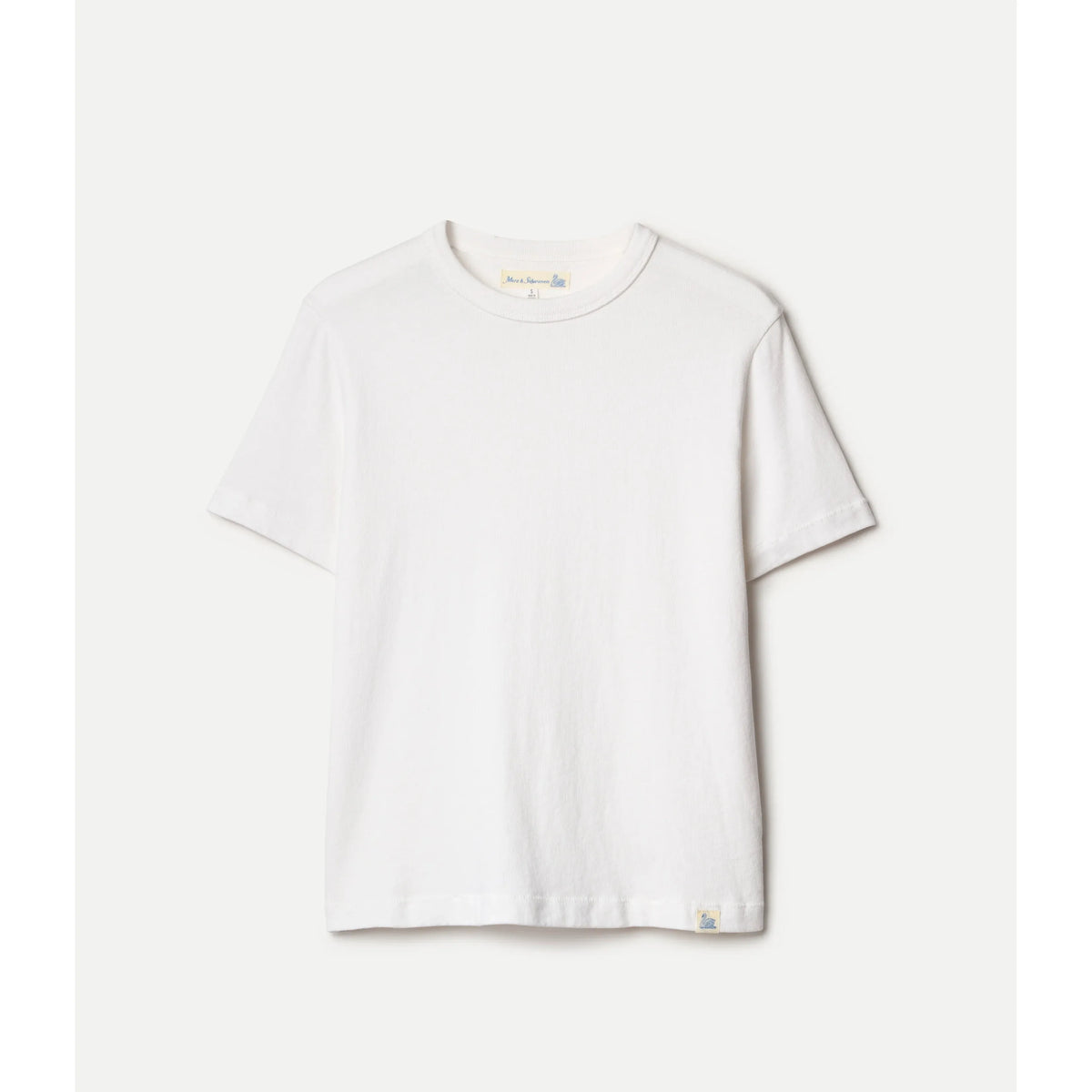 White Merz b. Schwanen women's jersey cotton T-shirt displayed on a hanger, showcasing its crisp fabric and classic fit.