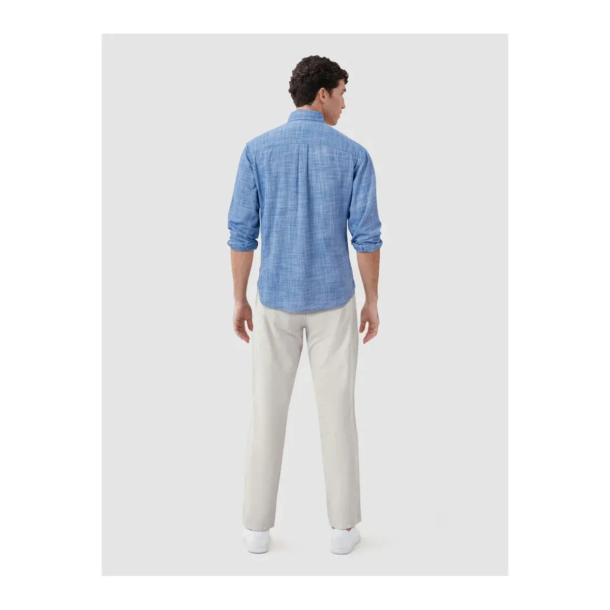 Men's Brian Slub Shirt in Strong Blue by Surfside Supply, featuring a casual fit and textured fabric, shown on a model.