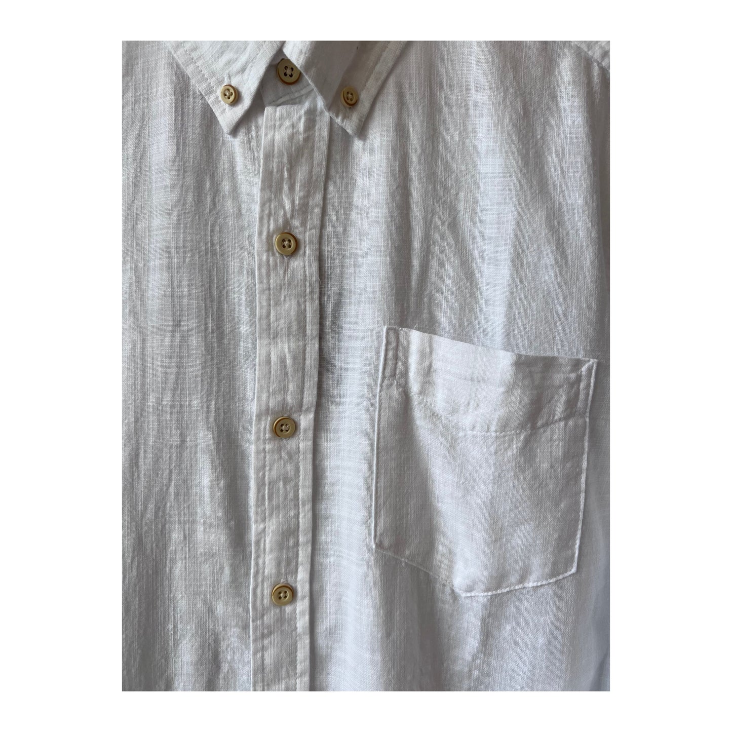 Men's white Brian Slub shirt by Surfside Supply, featuring a casual fit and soft fabric, displayed on a hanger.