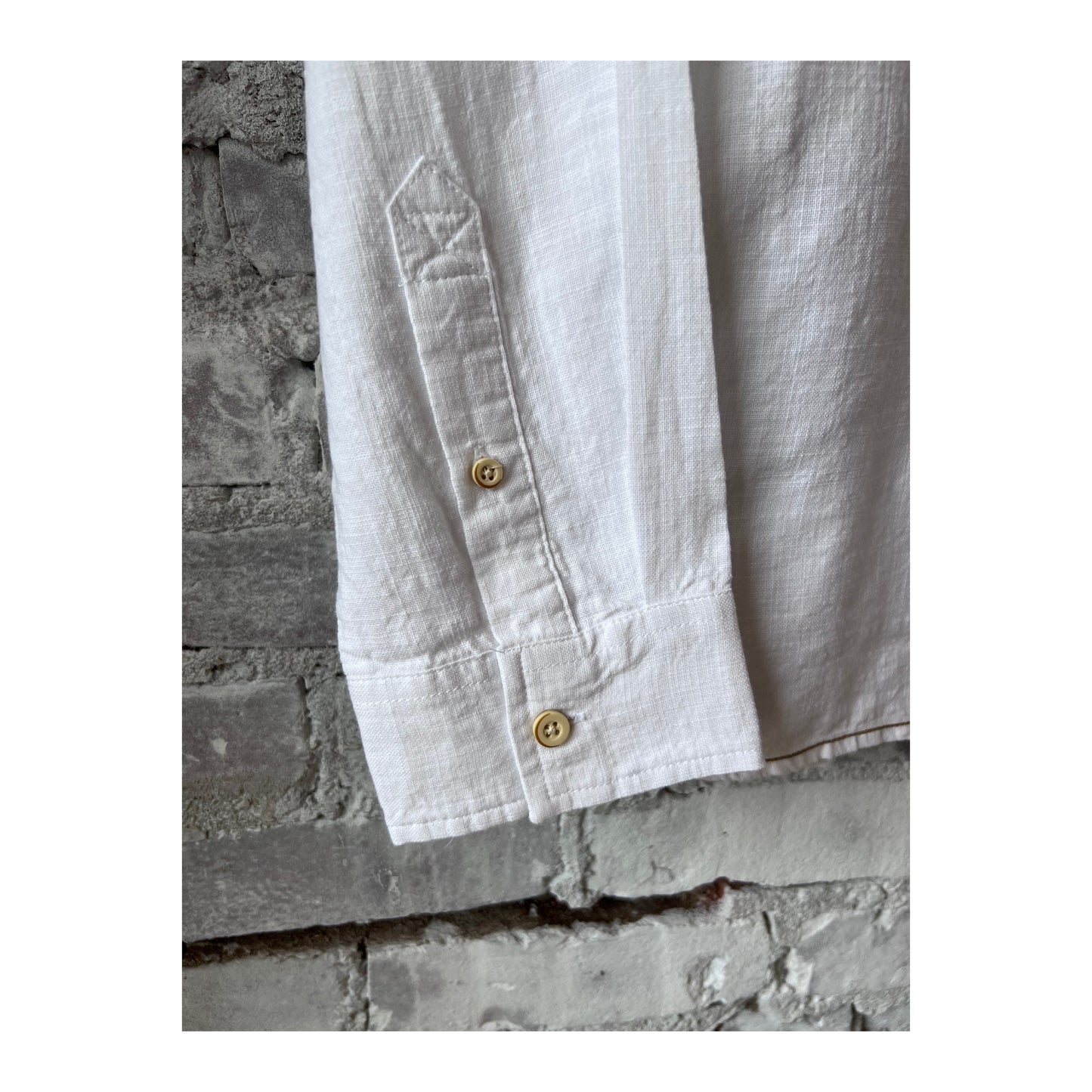 White men's Brian Slub Shirt by Surfside Supply, showing a casual fit with textured fabric and classic collar.