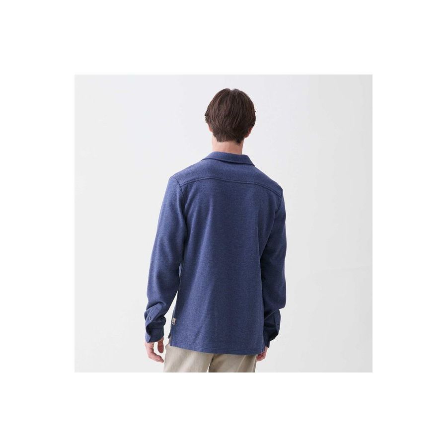 Men's navy Heather Cary L/S Ultra Soft Polo by Surfside Supply, shown in a close-up of the textured fabric and classic collar.