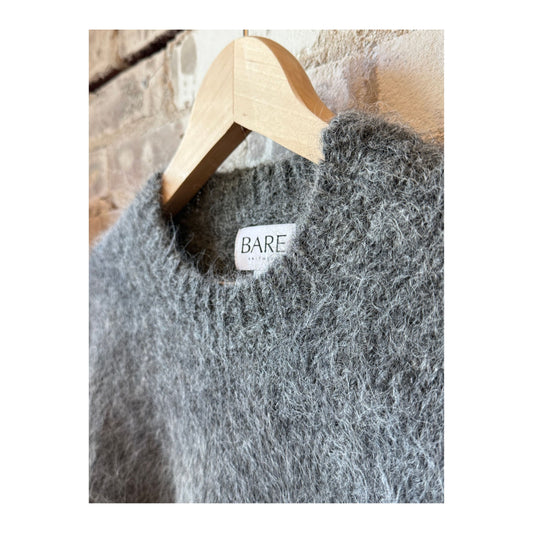 Women's Bare Knitwear Suri Alpaca Crewneck sweater in stone color, featuring soft alpaca fabric and a cozy fit.