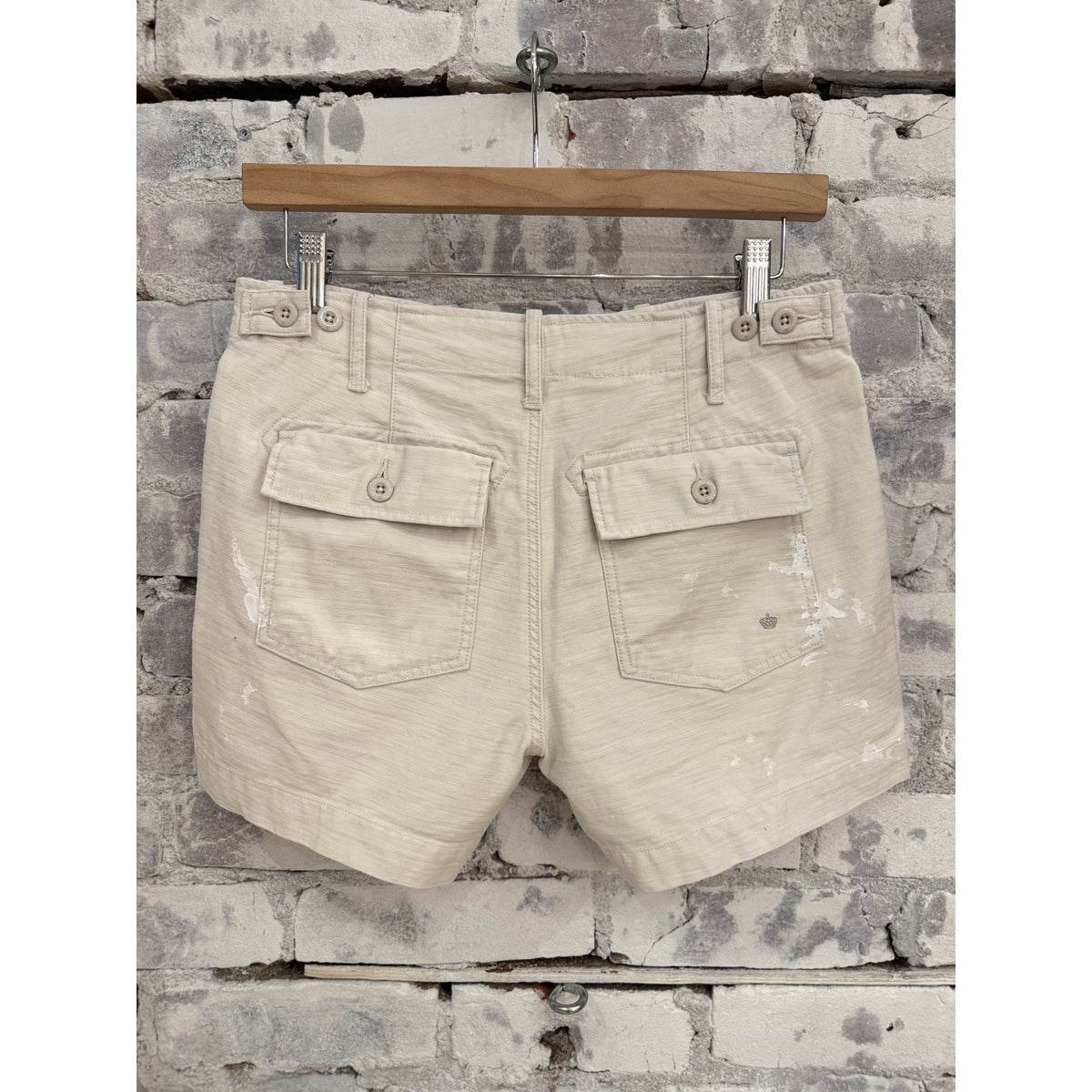 Women's Surplus Short Shorts by G1 with paint splatter canvas design, featuring a casual, distressed style and frayed hems.
