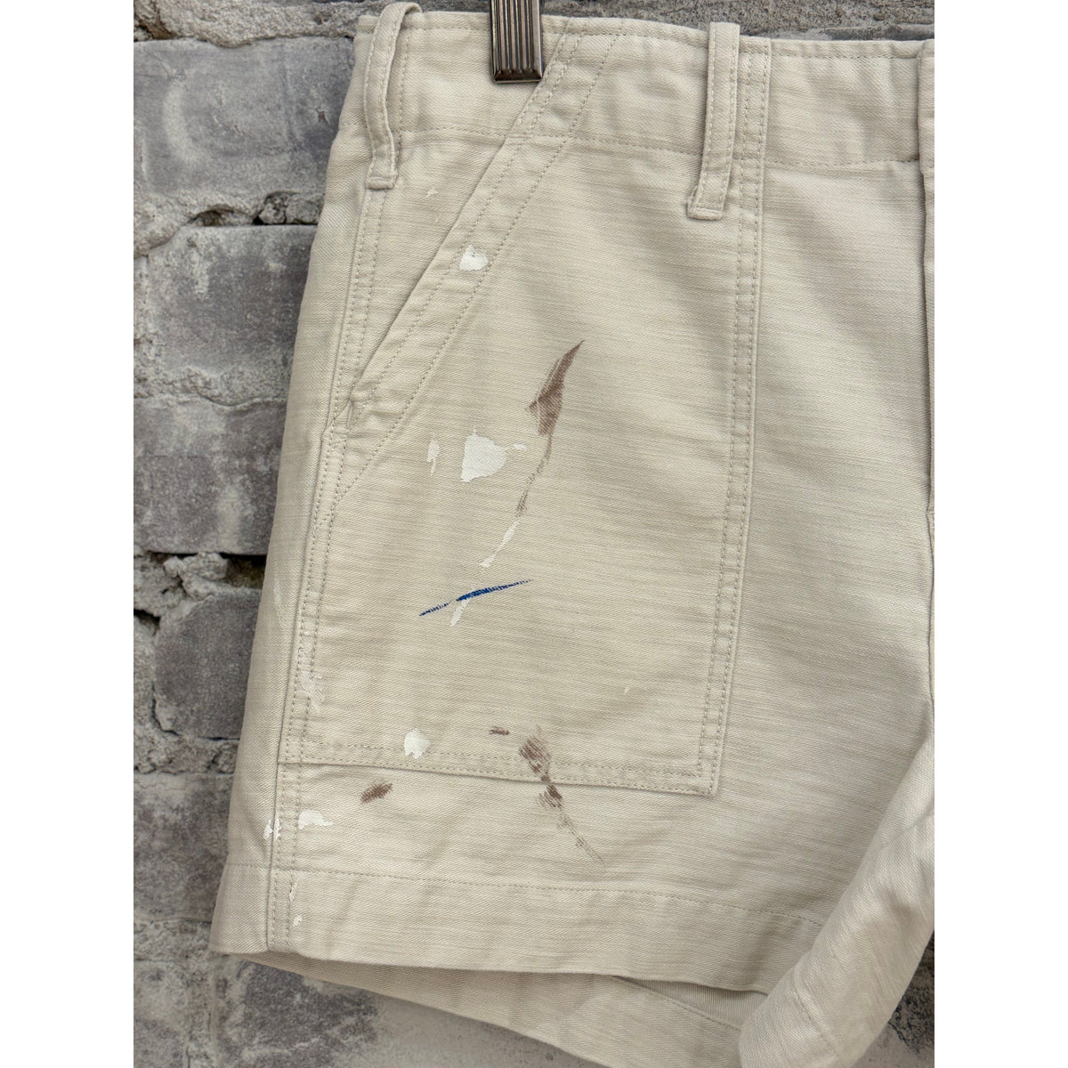 Women's G1 Surplus Short Shorts with paint splatter design, made from durable canvas fabric, casual summer style.