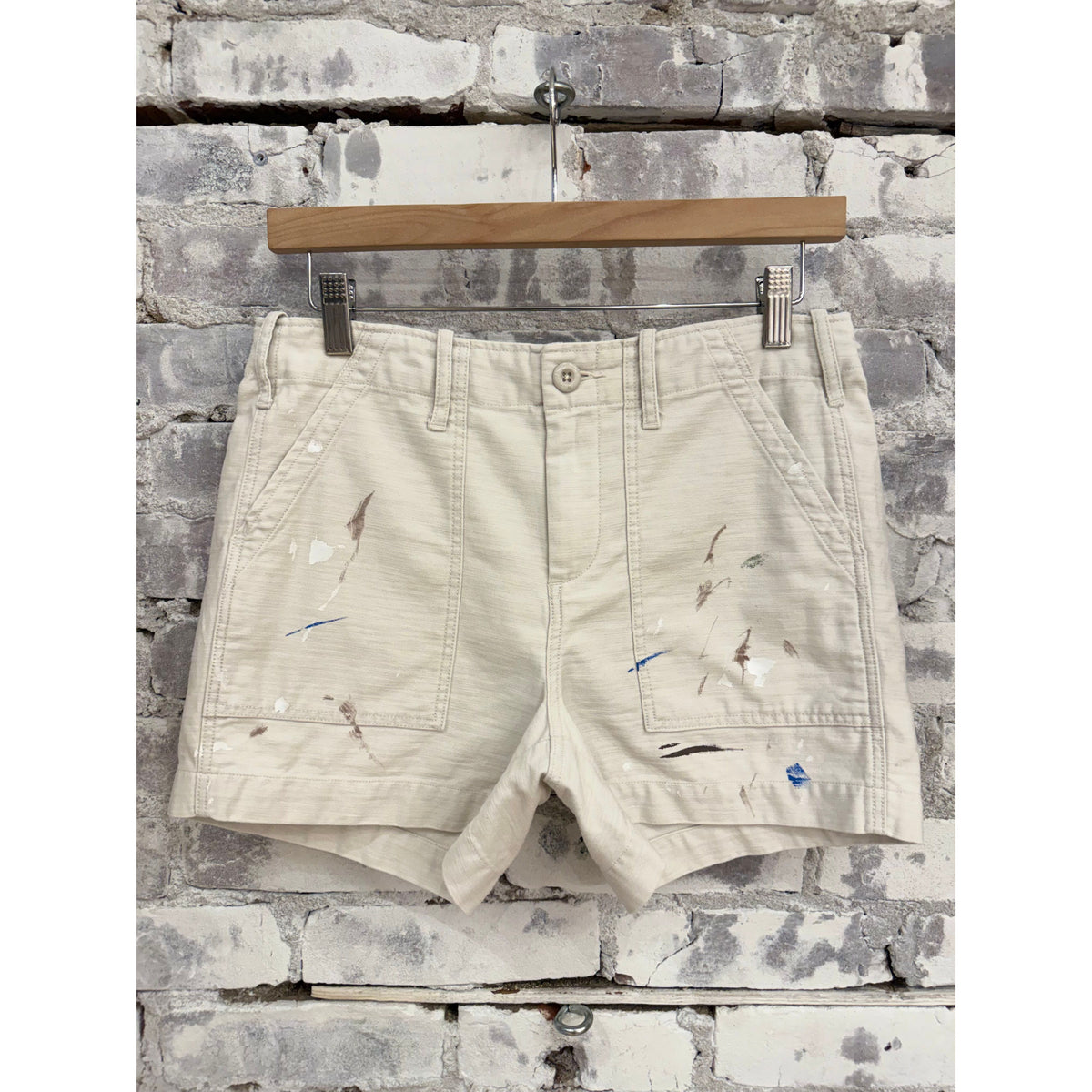 Women's Surplus Short Shorts with paint splatter canvas design by G1 Women's, featuring a casual, artistic style.
