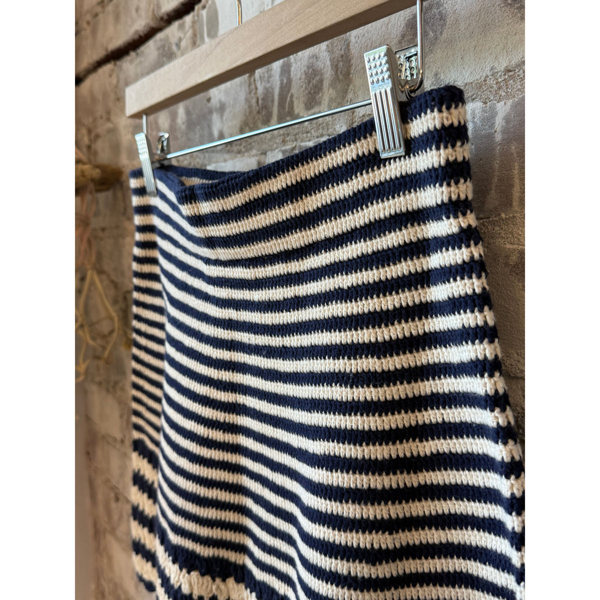 Women's Tatum Crochet Mini Skirt by ELEVEN SIX in ivory and navy stripe, featuring a detailed crochet pattern and fitted style.
