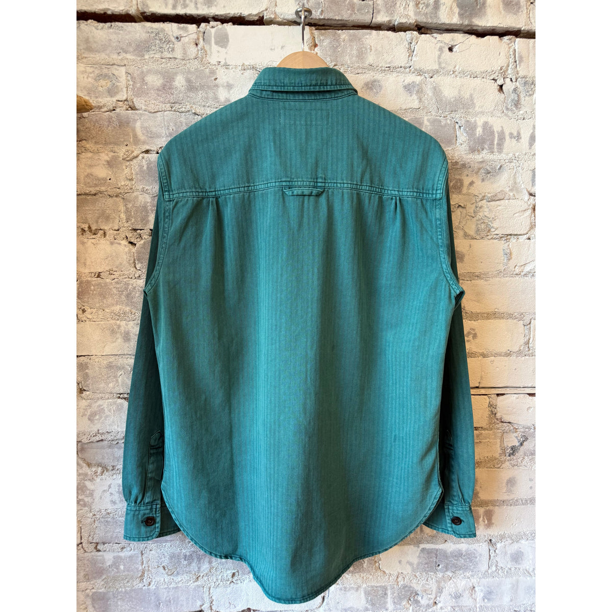Men's Teton Shirt in Kale color by Big Rock Candy Mountaineering, shown laid flat with front view and button details.