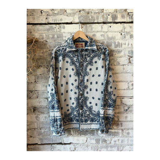 Men's indigo Paisley Blanket Shirt Jacket by MONOSTERO, showing the cozy, patterned fabric and relaxed fit.