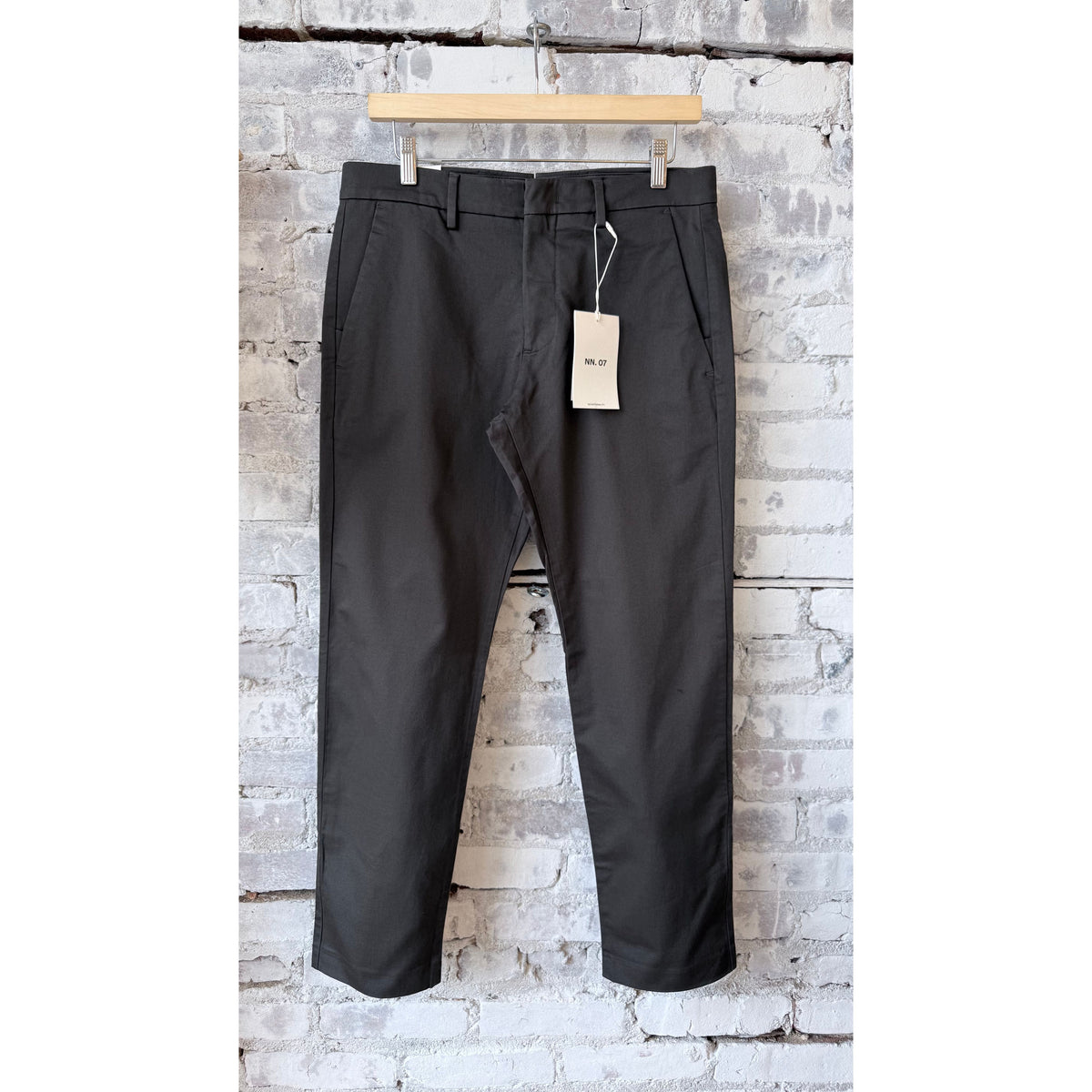 Men's NN07 Theo Classic Tailored Slim Fit Chino in dark army, showing the slim fit design and dark green color.