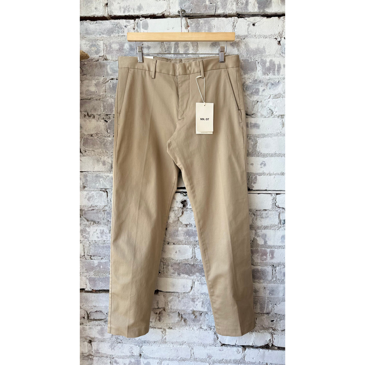 Men's NN07 Theo Classic Tailored Slim Fit Chino in khaki beige, showcasing the slim fit design and tailored style.