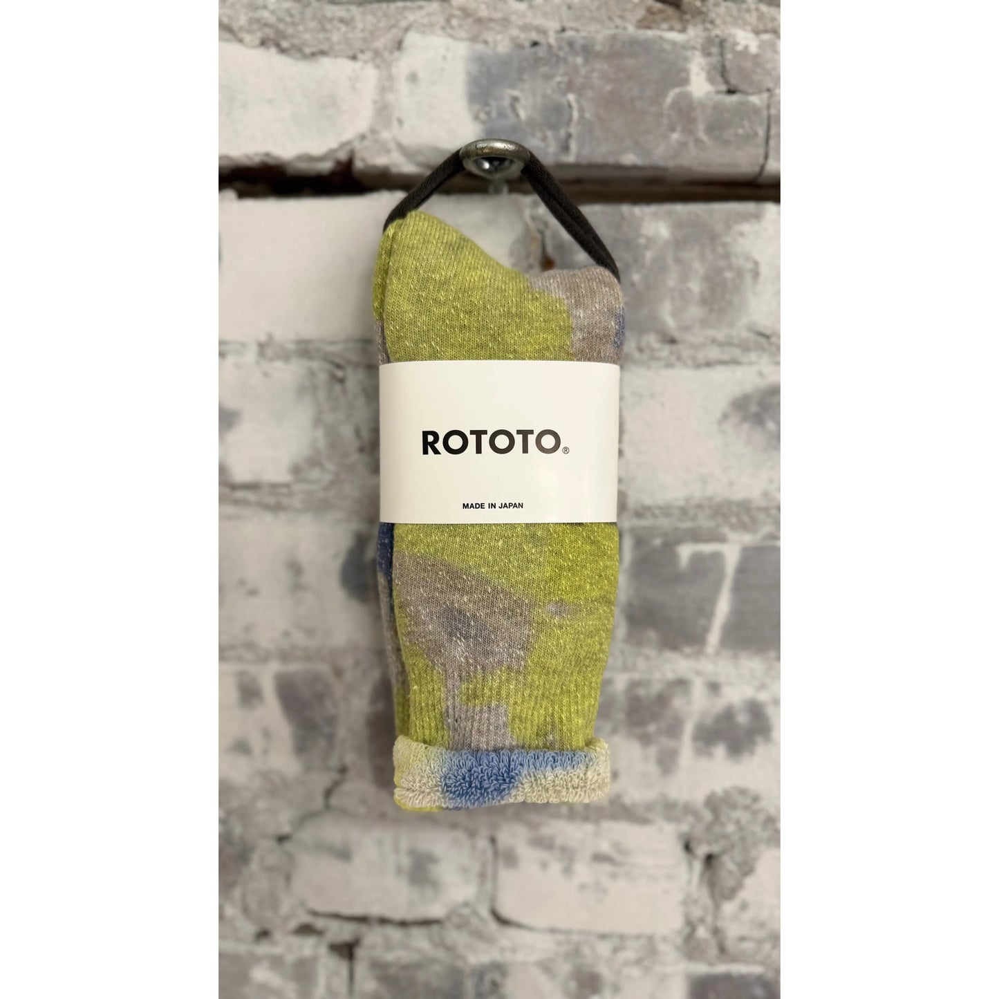 Men's Tie Dye Pile Socks by Rototo in lime and blue with colorful, cozy pile fabric and ribbed cuffs.