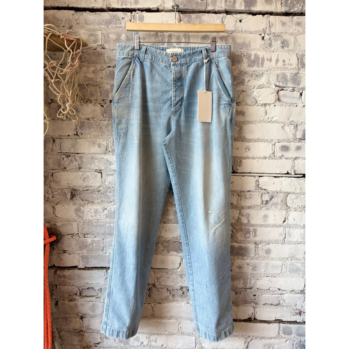 Light blue men's Toledo tapered relaxed jeans by Closed Men's, showcasing a casual fit with subtle fading and classic denim texture.