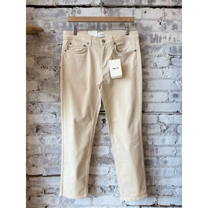 Men's NN07 Tony Classic Slim Fit Ivory Pant, tailored fit with clean design, shown on a hanger against a neutral background.