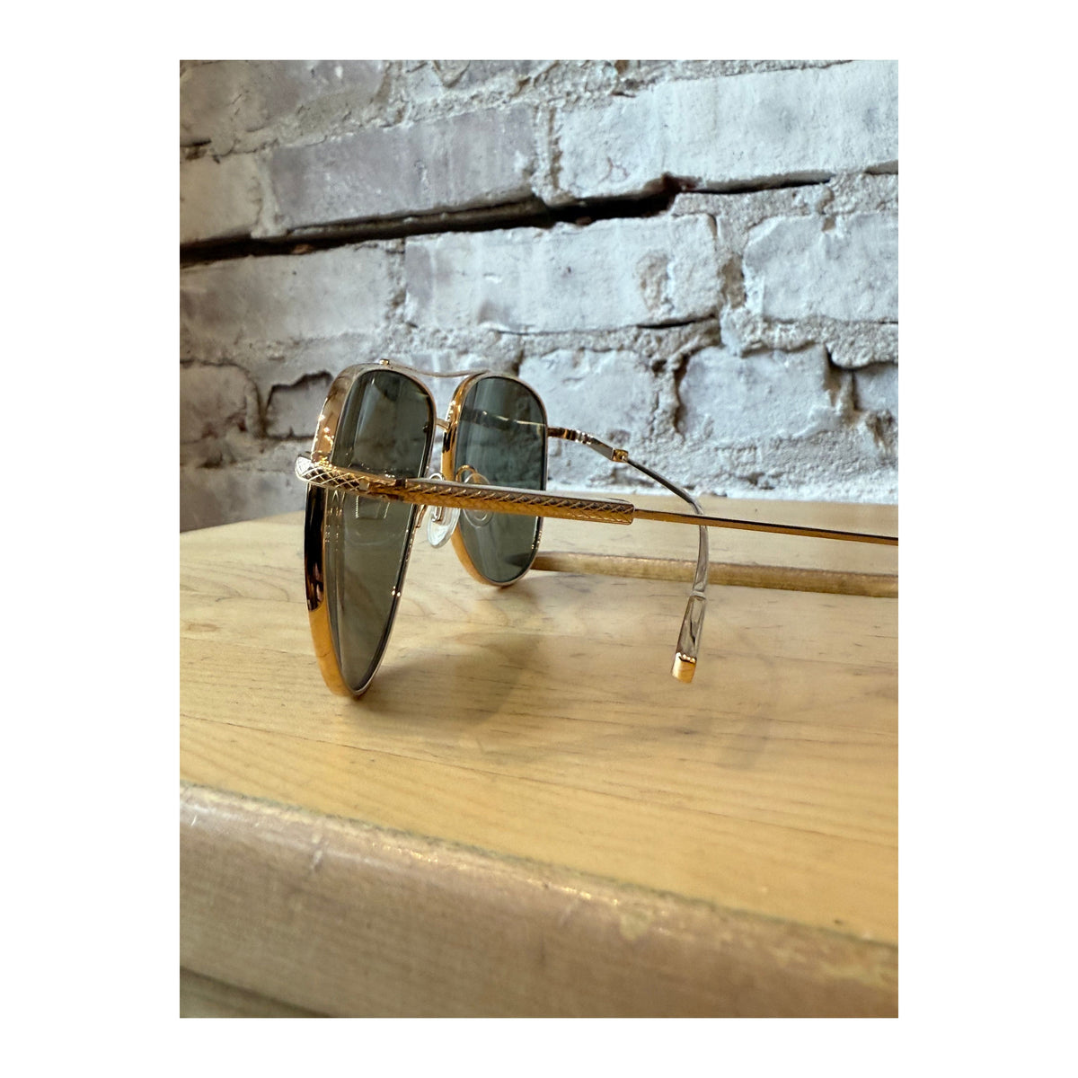 Barton Perreira Trask Sun sunglasses with gold frames and safari polarized lenses, stylish accessories for sun protection.