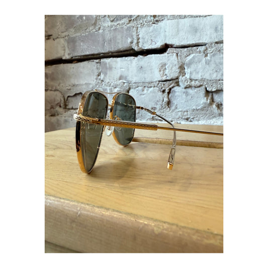 Barton Perreira Trask Sun sunglasses with gold frames and safari polarized lenses, stylish accessories for sun protection.