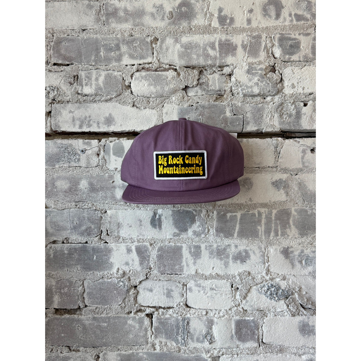 Men's Truckin' Twill Hat in Huckleberry color by Big Rock Candy Mountaineering, featuring a classic twill design and adjustable strap.