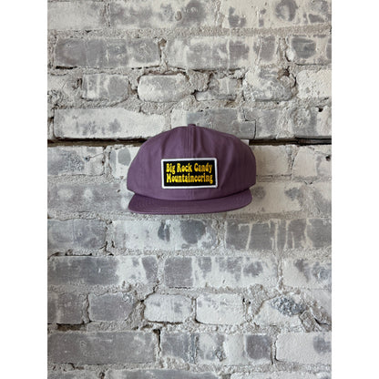 Men's Truckin' Twill Hat in Huckleberry color by Big Rock Candy Mountaineering, featuring a classic twill design and adjustable strap.