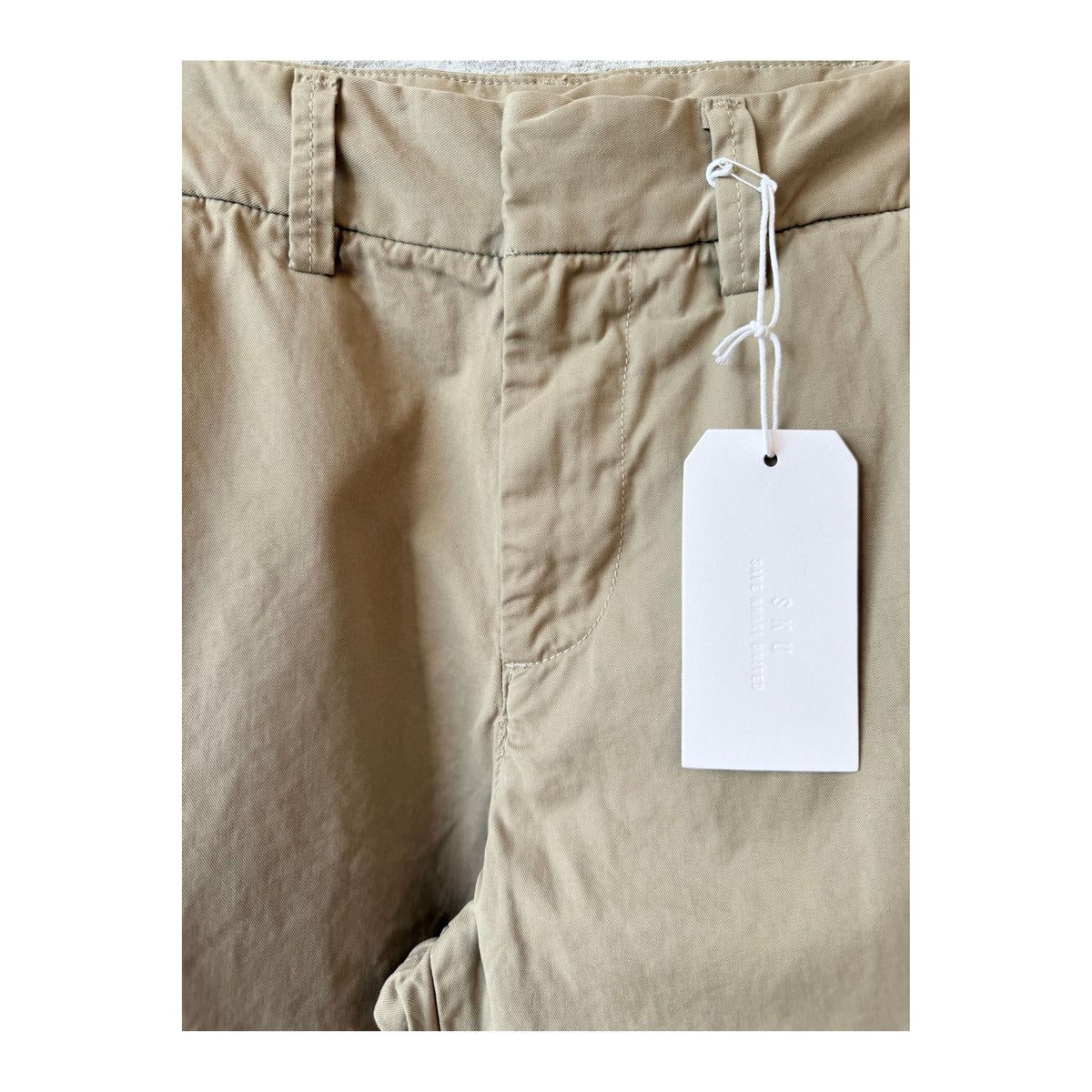 Men's khaki twill chino pants by Save Khaki United, featuring a classic fit with front and back pockets.