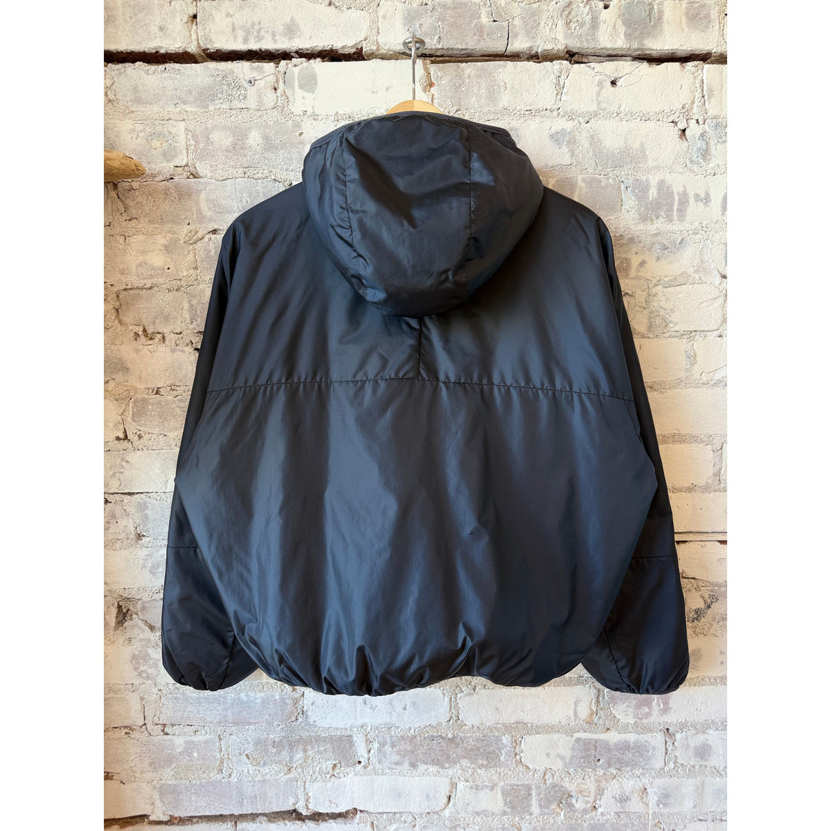 Women's Aspesi two-tone navy nylon reversible jacket with a sleek, stylish design and lightweight fabric.
