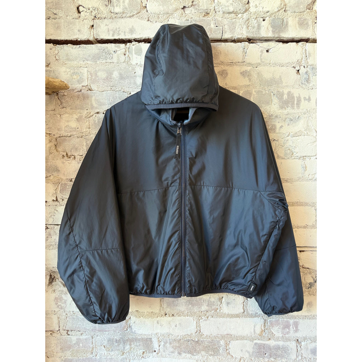 Women's two-tone navy nylon reversible jacket by Aspesi, showcasing a stylish two-tone design and reversible feature.