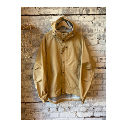 Men's Relwen Ultra Rain Shell in Sand, lightweight waterproof jacket with hood, zipper closure, and adjustable cuffs.