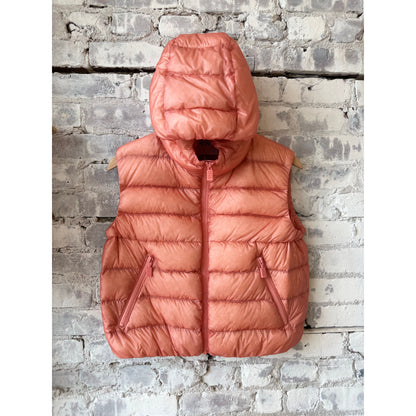 Women's ultralight ripstop nylon vest in powder pink by Aspesi, featuring a sleek, lightweight design for outdoor wear.