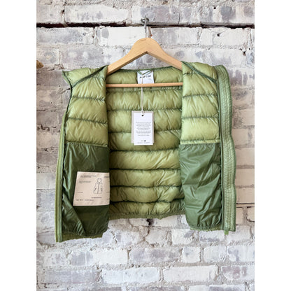 Women's Aspesi ultralight ripstop nylon vest in sage green, showing the lightweight fabric and minimalist design.