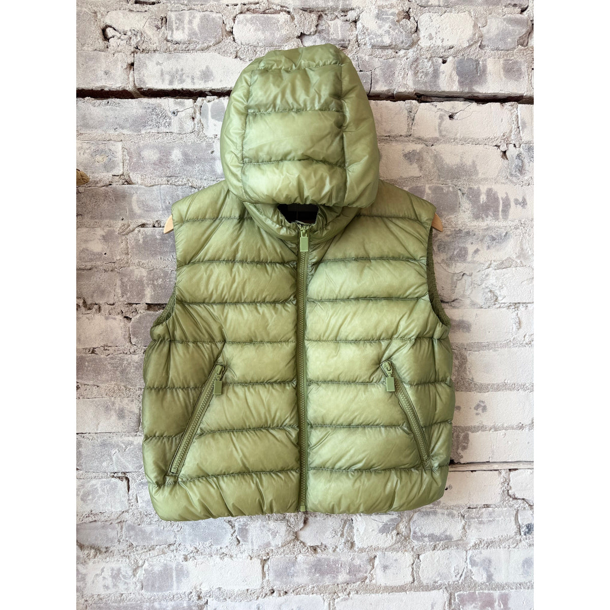 Women's ultralight ripstop nylon vest in sage green by Aspesi, featuring a lightweight design and durable fabric.