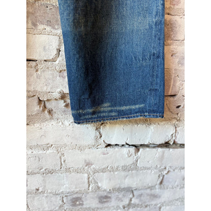 Unisex 13.5oz dark selvedge denim straight-cut jeans by Chimala, showing the fit and dark denim fabric.
