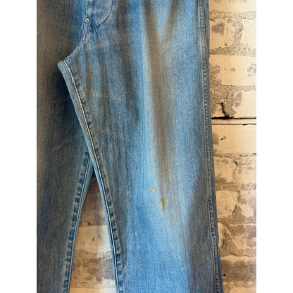 Unisex Chimala 13oz wide-width adjustable pants in smoky light fabric, featuring relaxed fit and functional design.