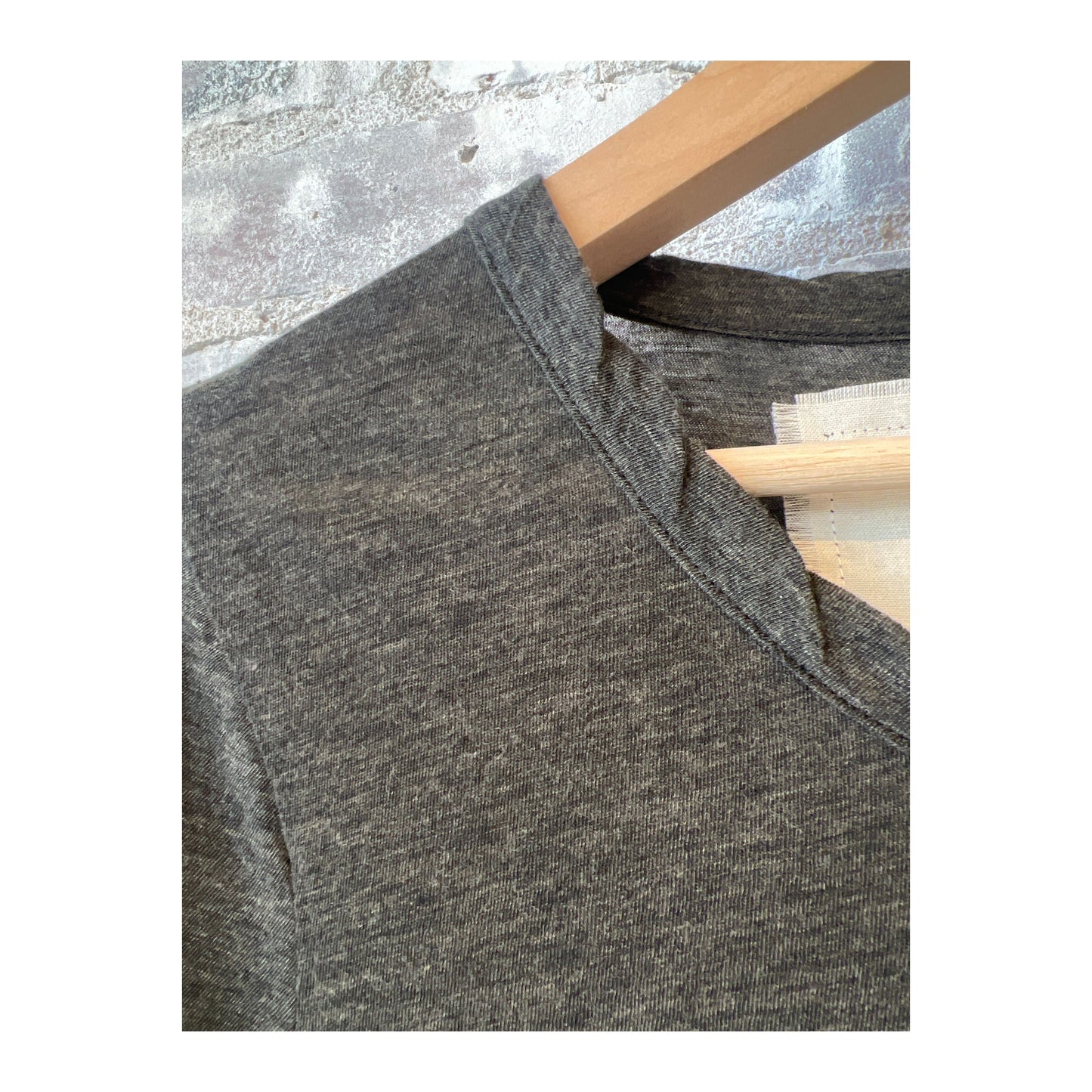 Women's black Hi-Soft Jersey LS Crew shirt by V::Room, showing a close-up of the soft fabric and classic long-sleeve design.