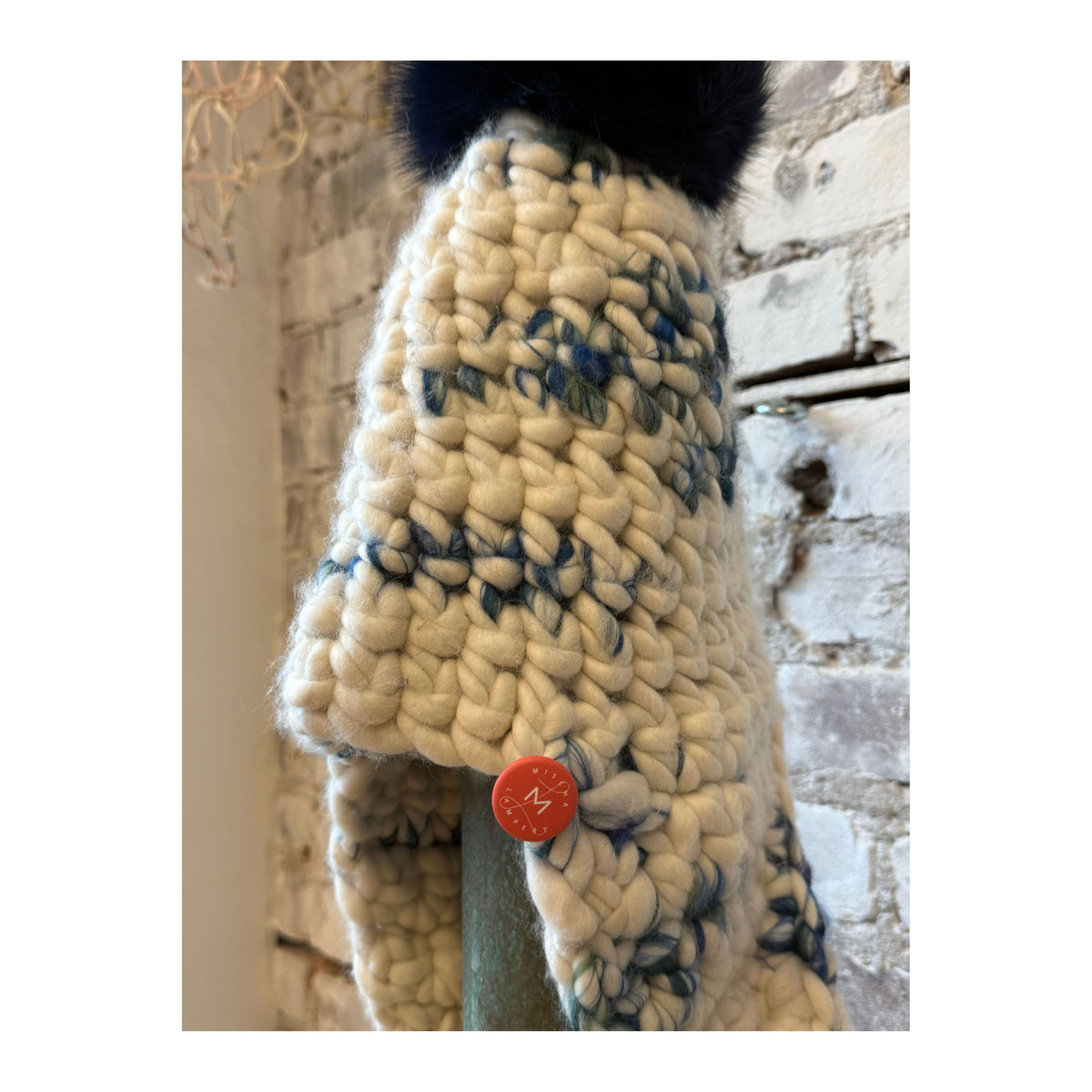Women's Mischa Lampert Vacation Fro Tri top with navy blue color and XL Pom embellishments, stylish and comfortable for summer wear.