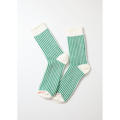 Men's vertical striped socks by Rototo in white and green, featuring bold, colorful stripe pattern for stylish comfort.
