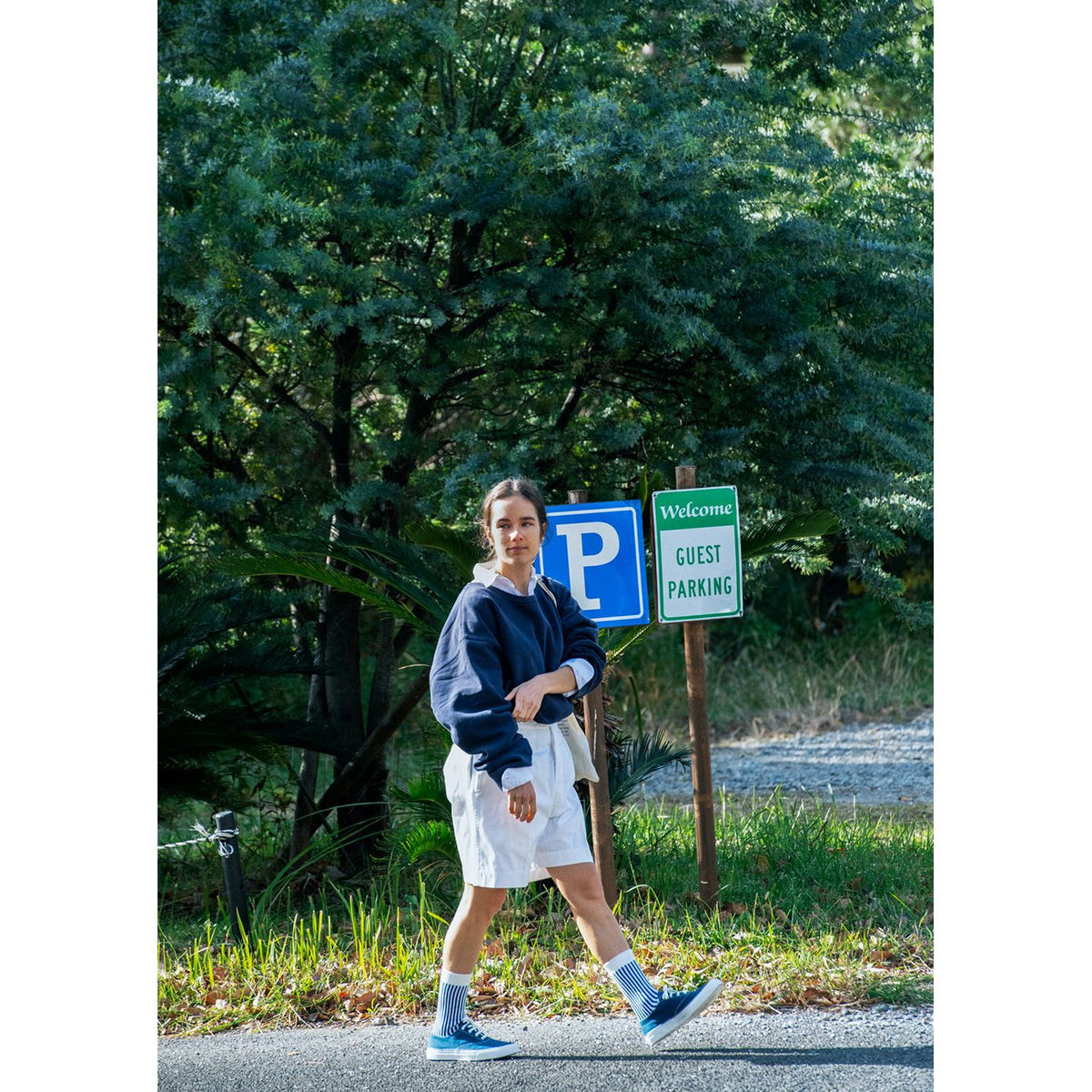 Men's vertical striped socks in white and green by Rototo, featuring a comfortable fit and bold pattern.