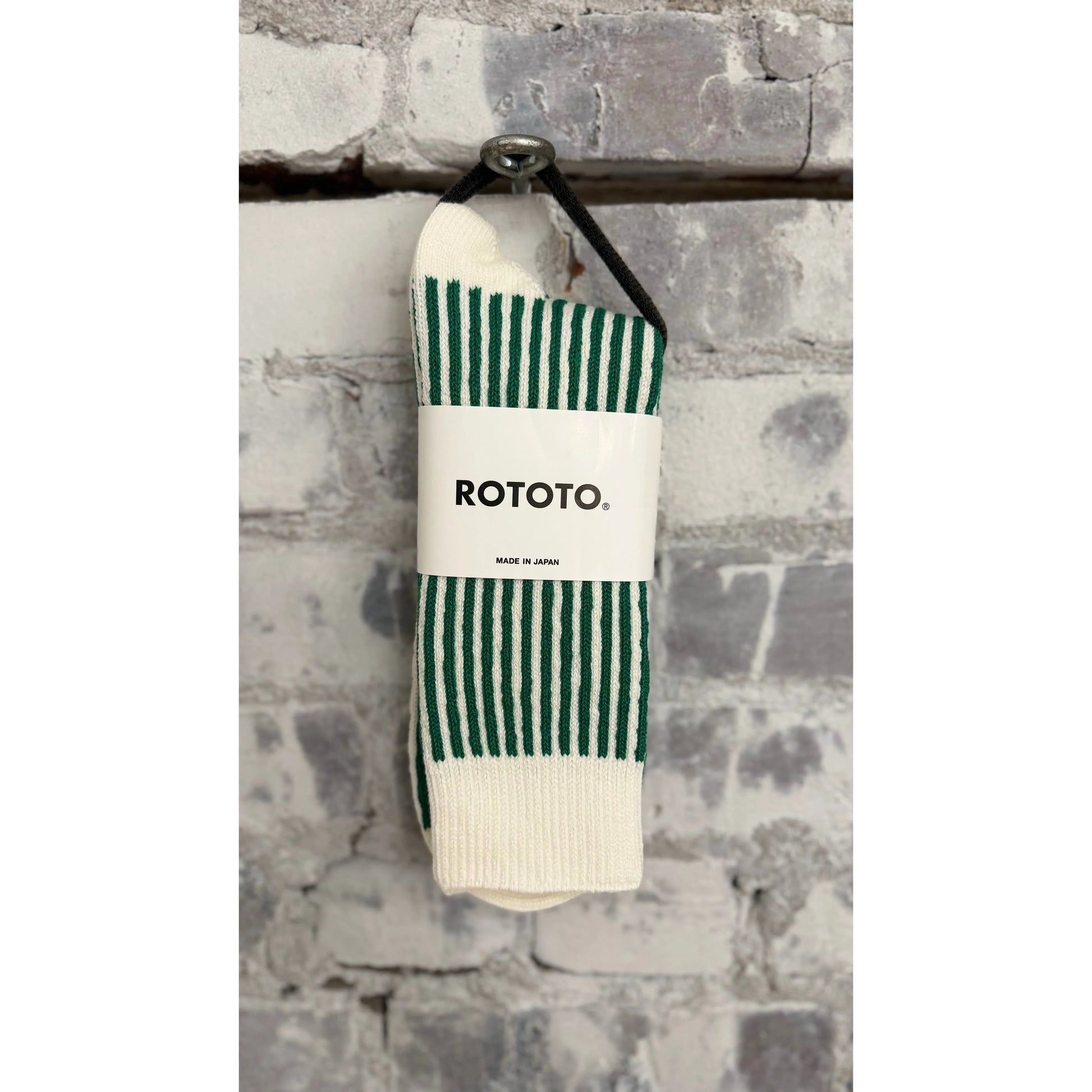 Men's vertical striped socks by Rototo in white and green, featuring a classic pattern and comfortable fit.