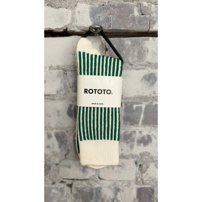 Men's vertical striped socks by Rototo in white and green, featuring a classic pattern and comfortable fit.