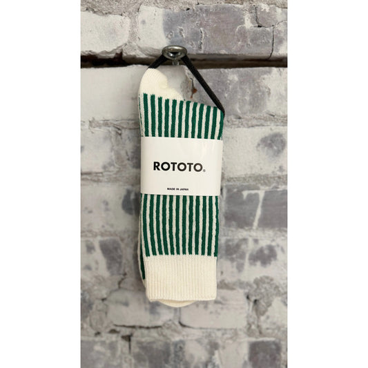 Men's vertical striped socks by Rototo in white and green, featuring bold vertical stripes and comfortable fabric.