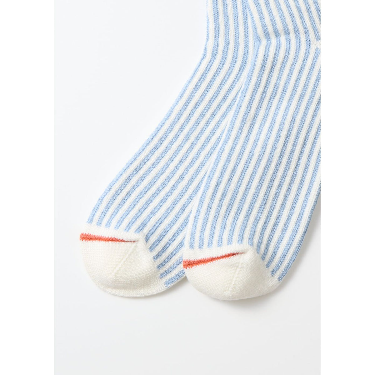 Men's vertical striped socks by Rototo in white and light blue, featuring a comfortable fit and stylish pattern.