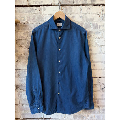 Men's Aspesi Vic Shirt in denim blue, featuring a classic fit and button-down design, displayed on a hanger.