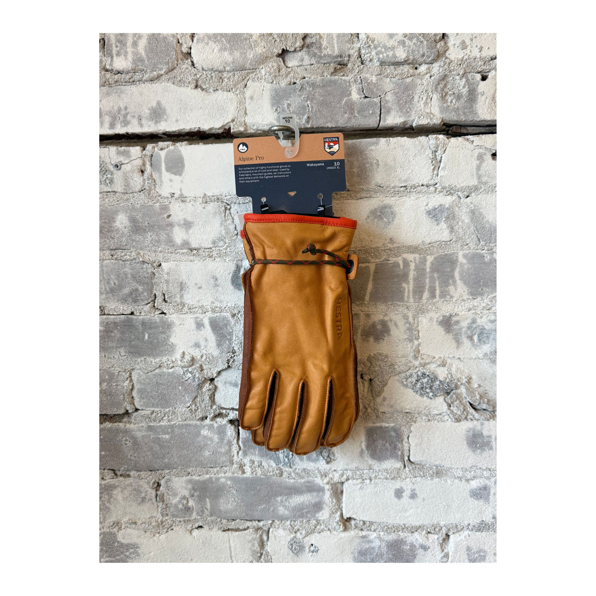 Men's Hestra Wakayama 5-Finger Glove in cork and brown leather, showing the textured, flexible glove with detailed stitching.