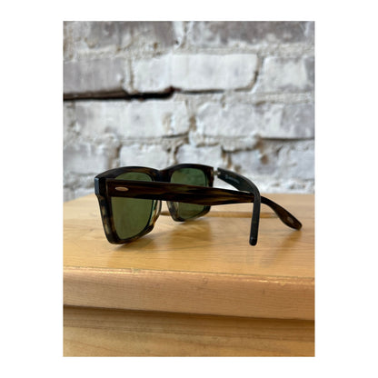 Men's Barton Perreira Walker polarized sunglasses in matte sulcata tortoise and forest with tinted lenses.