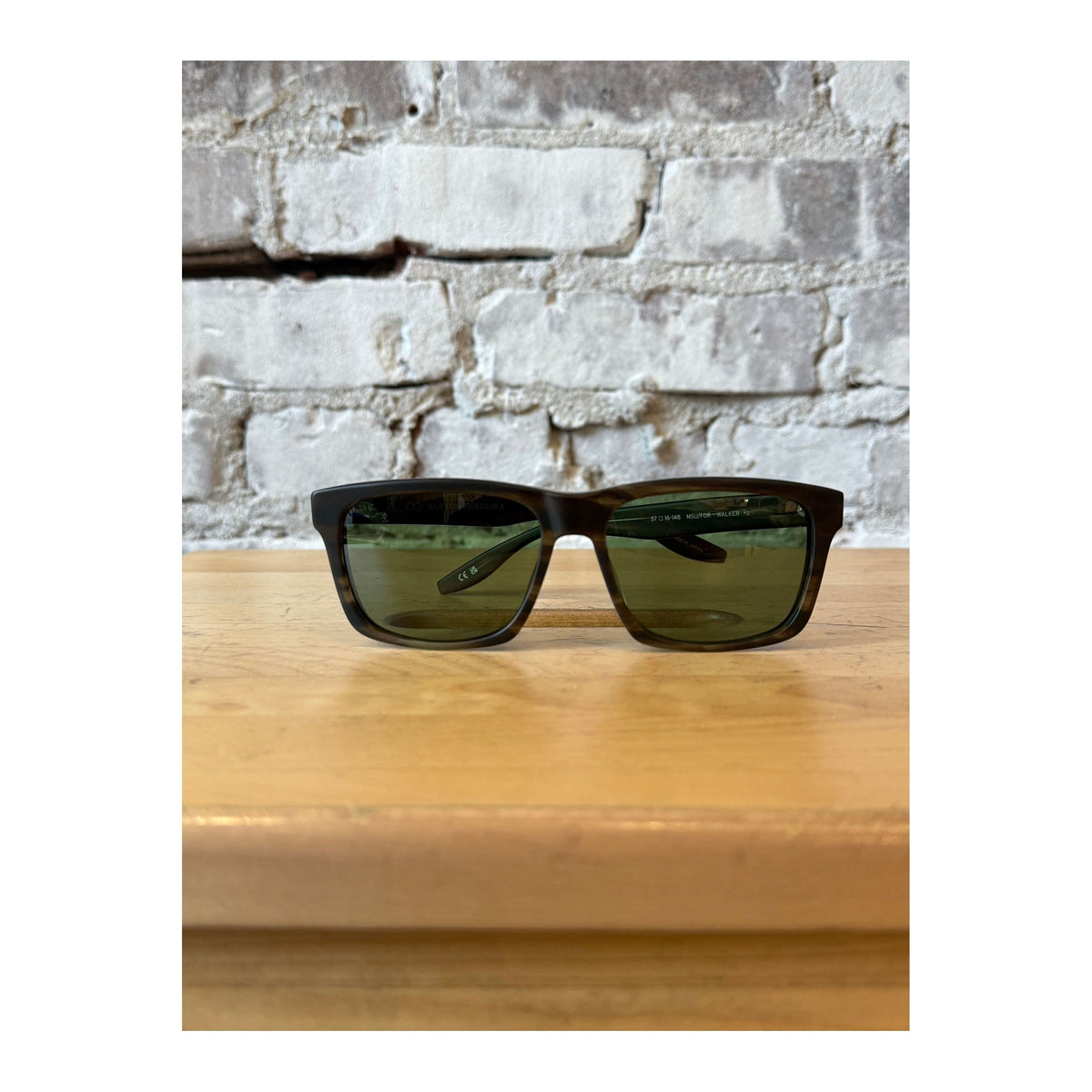 Men's Walker polarized sunglasses by Barton Perreira with matte sulcata tortoise and forest green frames and polarized lenses.