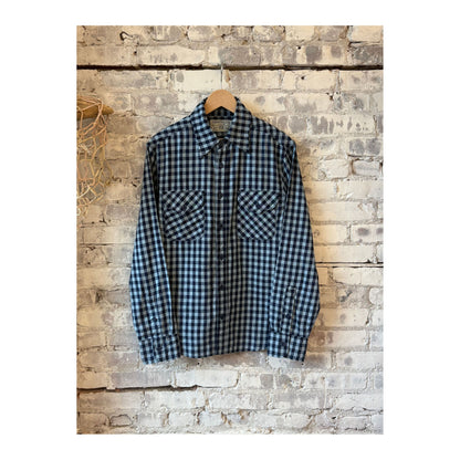 Men's Wells Gingham Workwear Shirt by Freenote Cloth in indigo, featuring classic gingham pattern and durable workwear style.