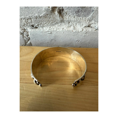Sterling silver oxidized cuff bracelet from Krystyna's Silver, showcasing intricate Western-inspired design and craftsmanship.