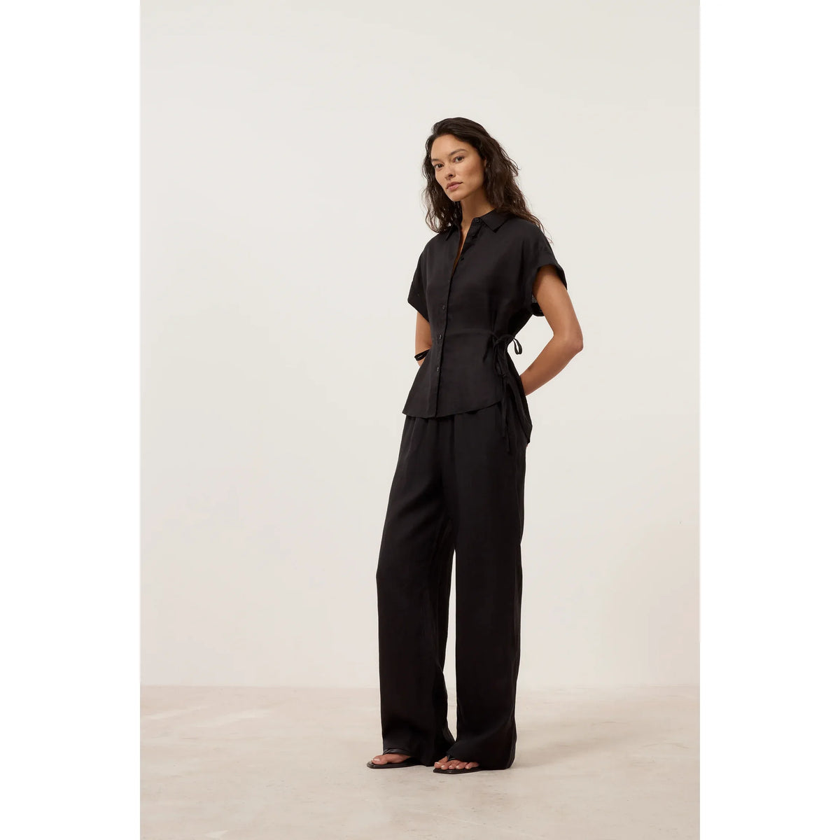 Women's Winona Wide Linen Pants in black by Closed Women's, featuring a relaxed fit and lightweight fabric.