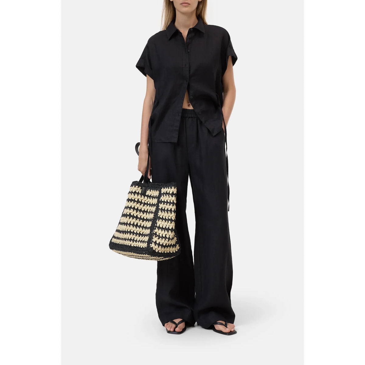 Black Winona Wide Linen Pants for women by Closed Women's, featuring a relaxed fit and lightweight linen fabric.