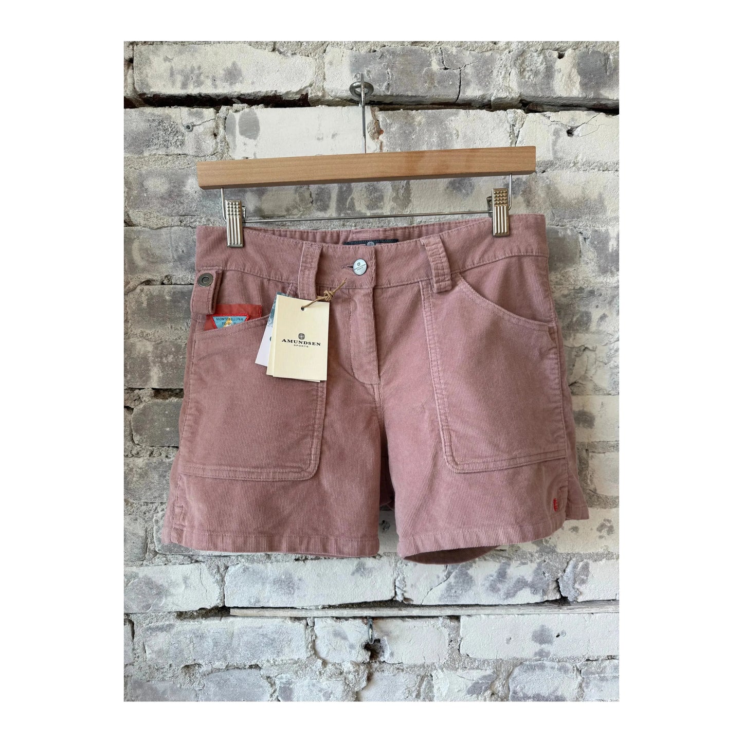 Women’s Amundsen 5-inch Concord Garment Dyed Shorts in faded peony pink, casual fit with garment dye finish, shown on model.
