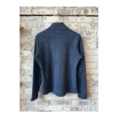 Women's Amundsen Hut Half Zip in faded navy, featuring a high collar and half-zip design, laid flat with textured fabric details.