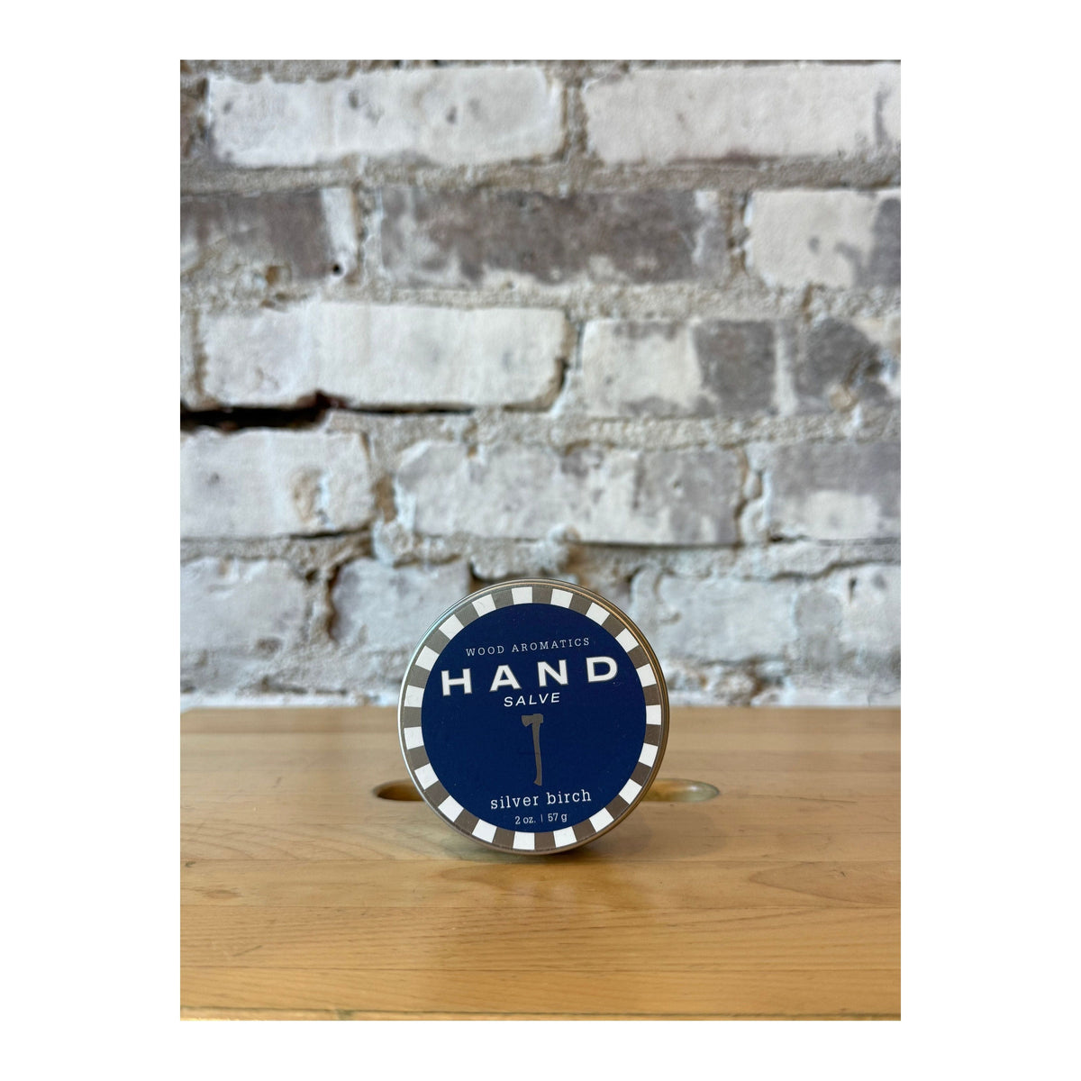 Silver Birch hand salve from Wood Aromatics by Kalastyle Soap Co., with a natural wooden container and silver accent.
